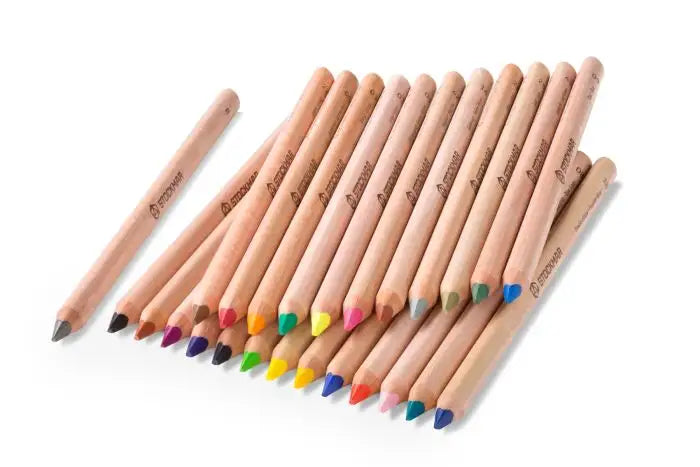 colored pencils loose in a row showing assorted colors