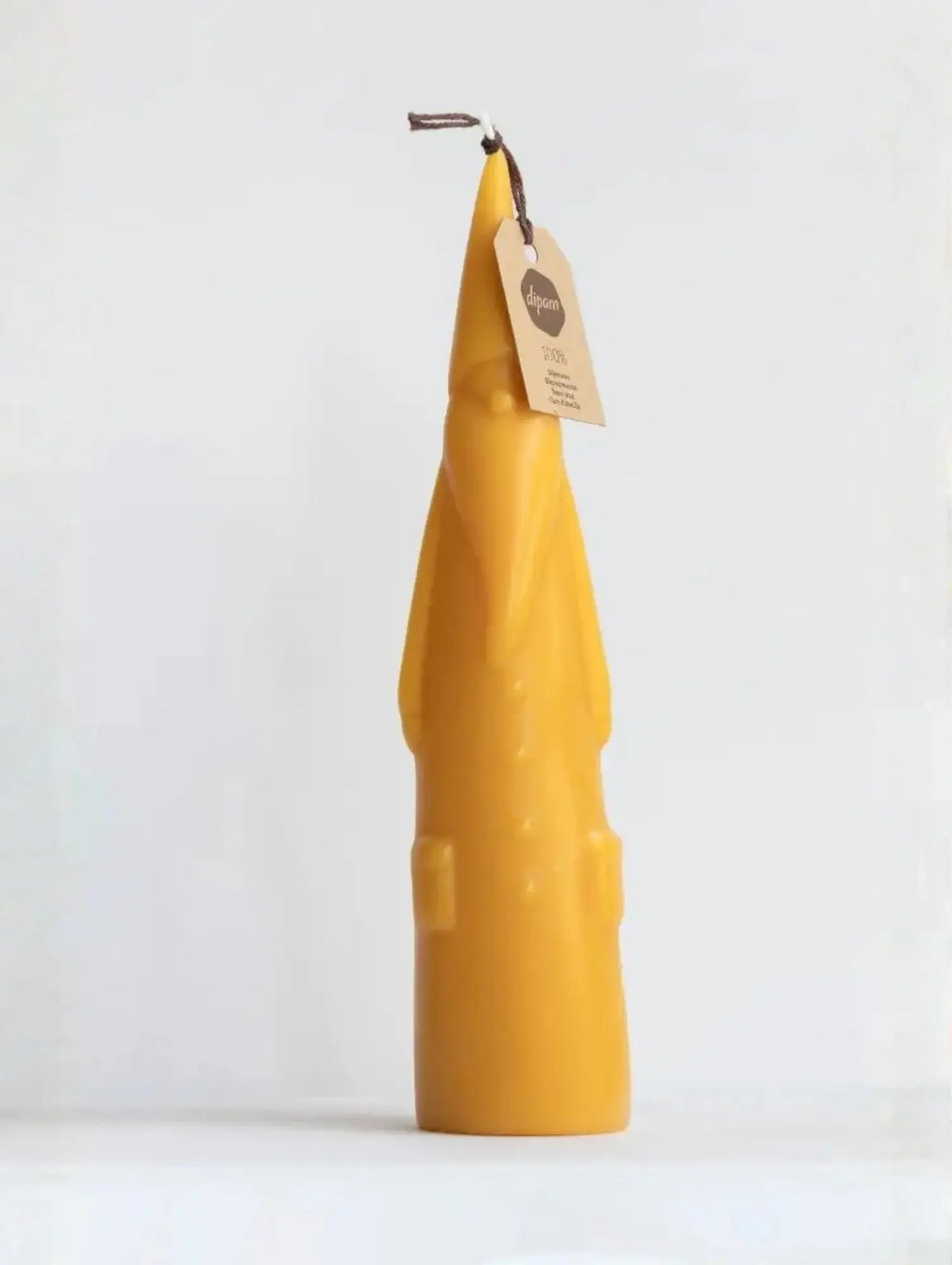 Tall Santa Claus Beeswax Candle with Dipam tag on white background