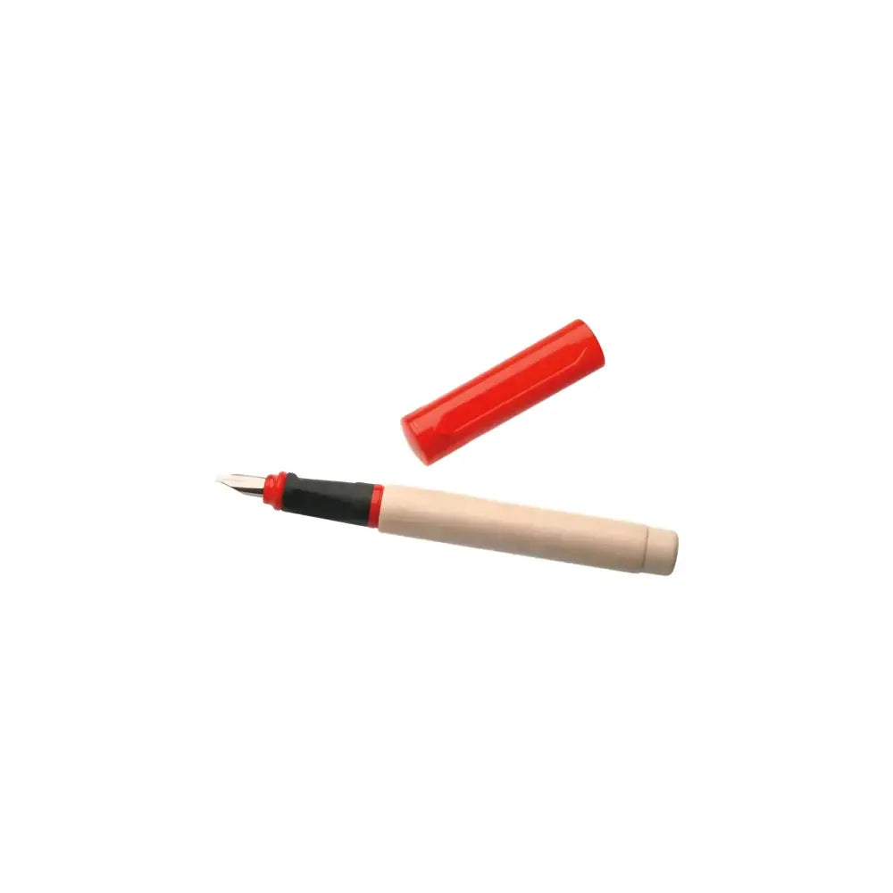 Red and black wooden calligraphy pen on a white background