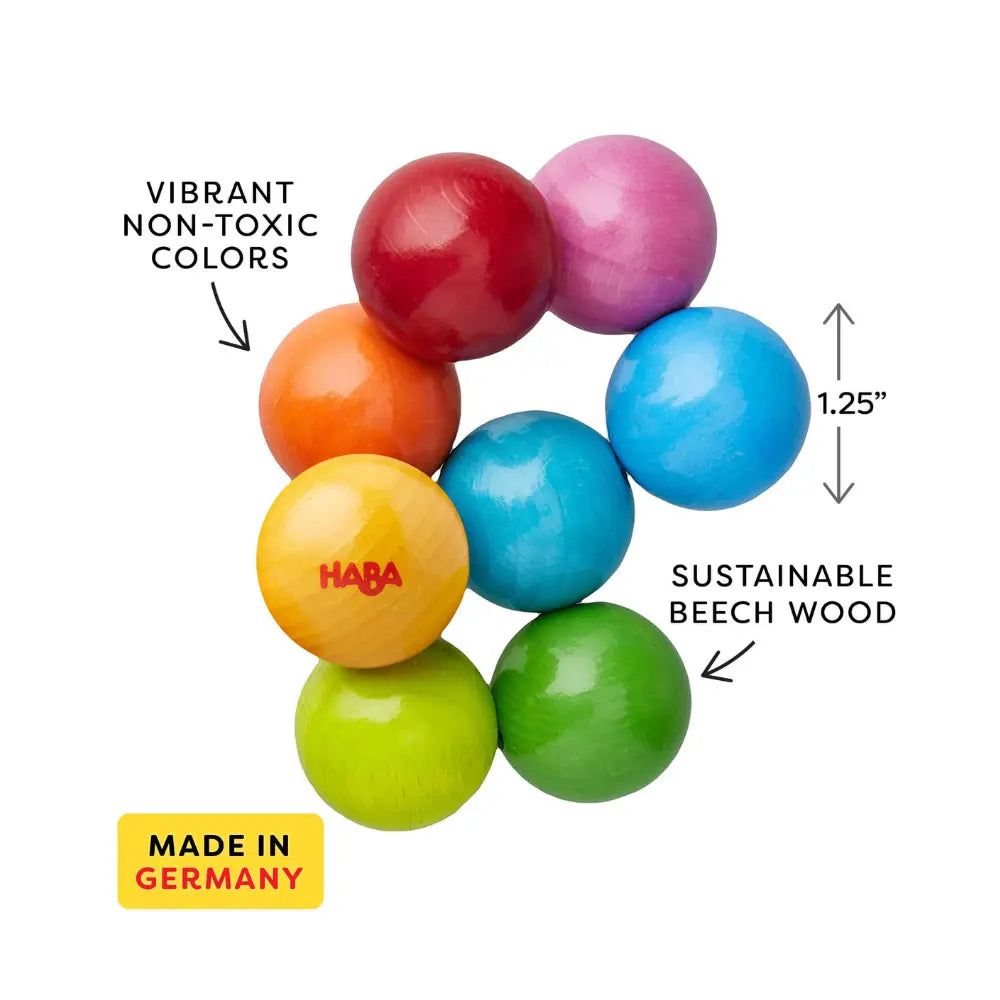 Colorful wooden balls with HABA branding, labeled for vibrant non-toxic colors, sustainable beech wood, and made in Germany.