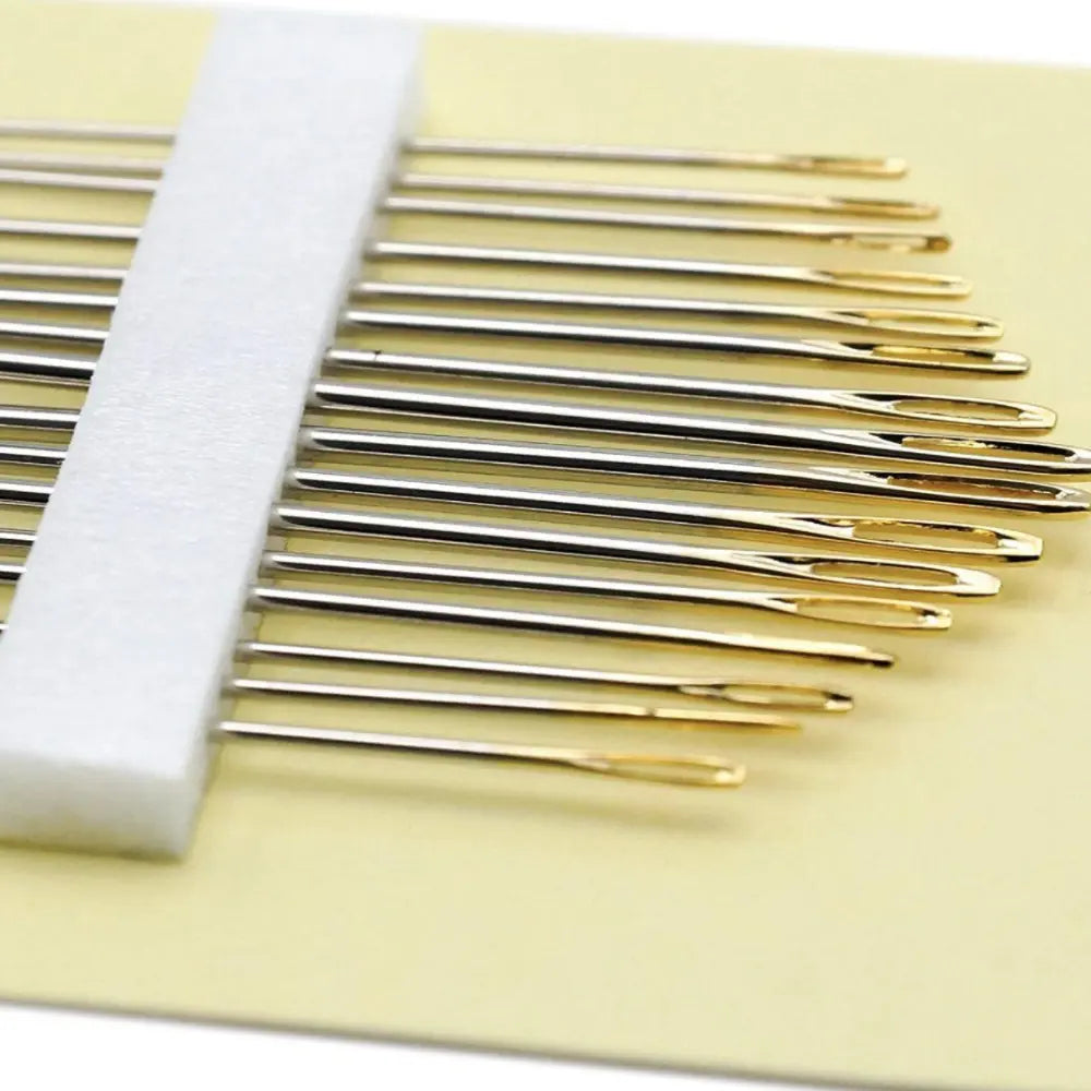 Close up of clover gold eye embroidery needles