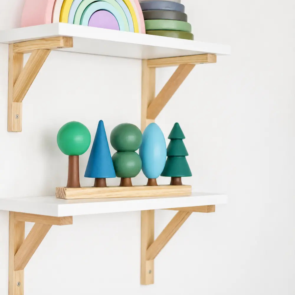 wooden trees for small world play wooden trees on a wall shelf