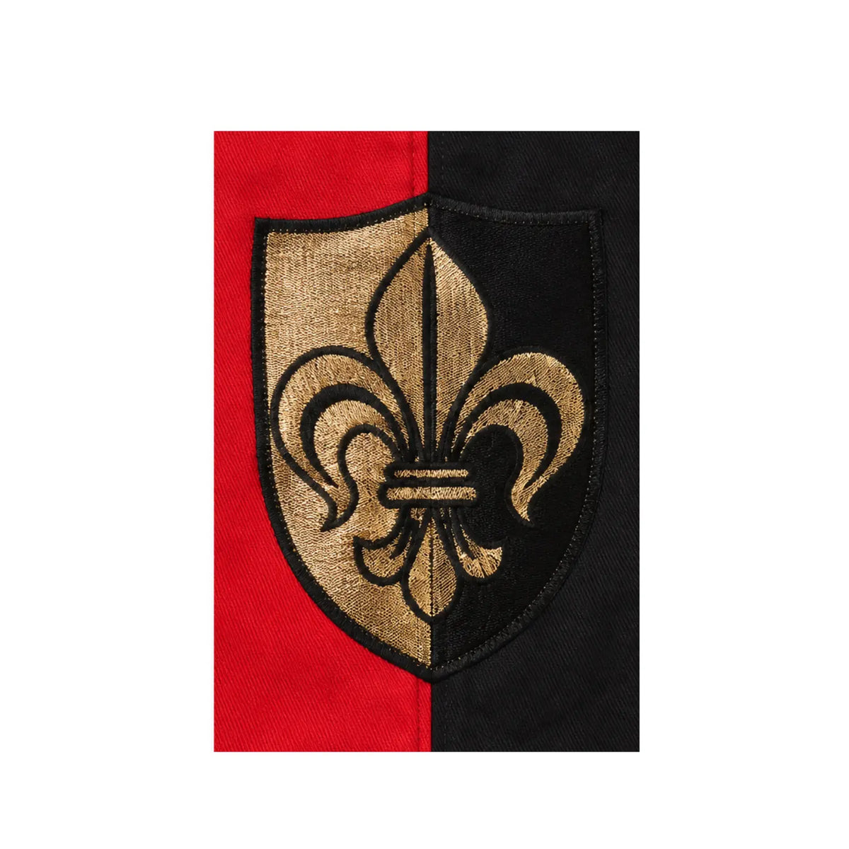 Close of of fleur-de-lis-herald on a childen's knight surcoat for dress up and pretend play
