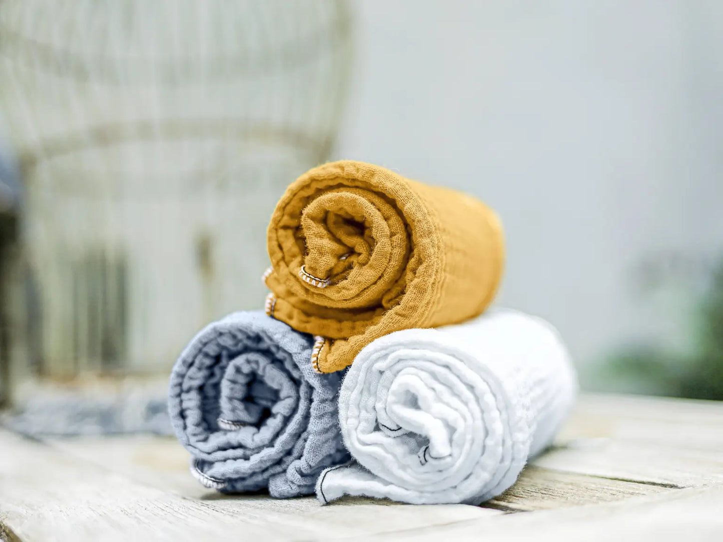 Rolled organic cotton Bitty Cloths in teal gray and mustard