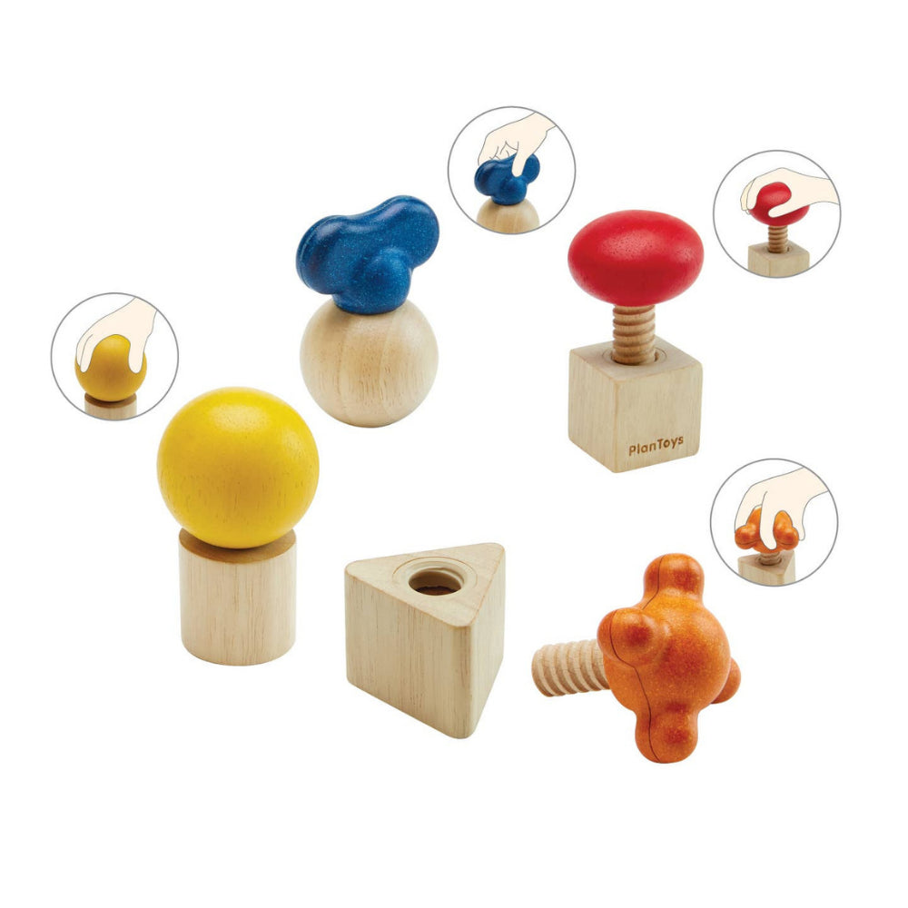 Set of wooden shape hand-eye developmental toys with colorful tops on a white background