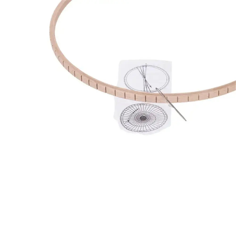Wooden circular loom tool with a white background