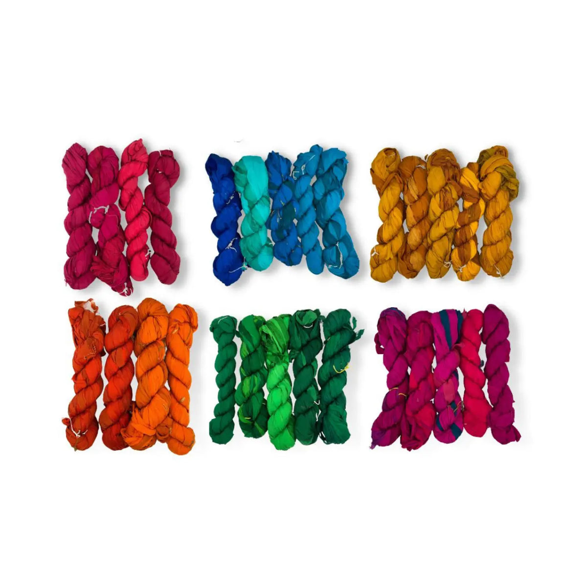All six colorways of recycled sari silk chiffon ribbon yarn as twisted skeins: red, blues, gold, orange, greens, and magenta