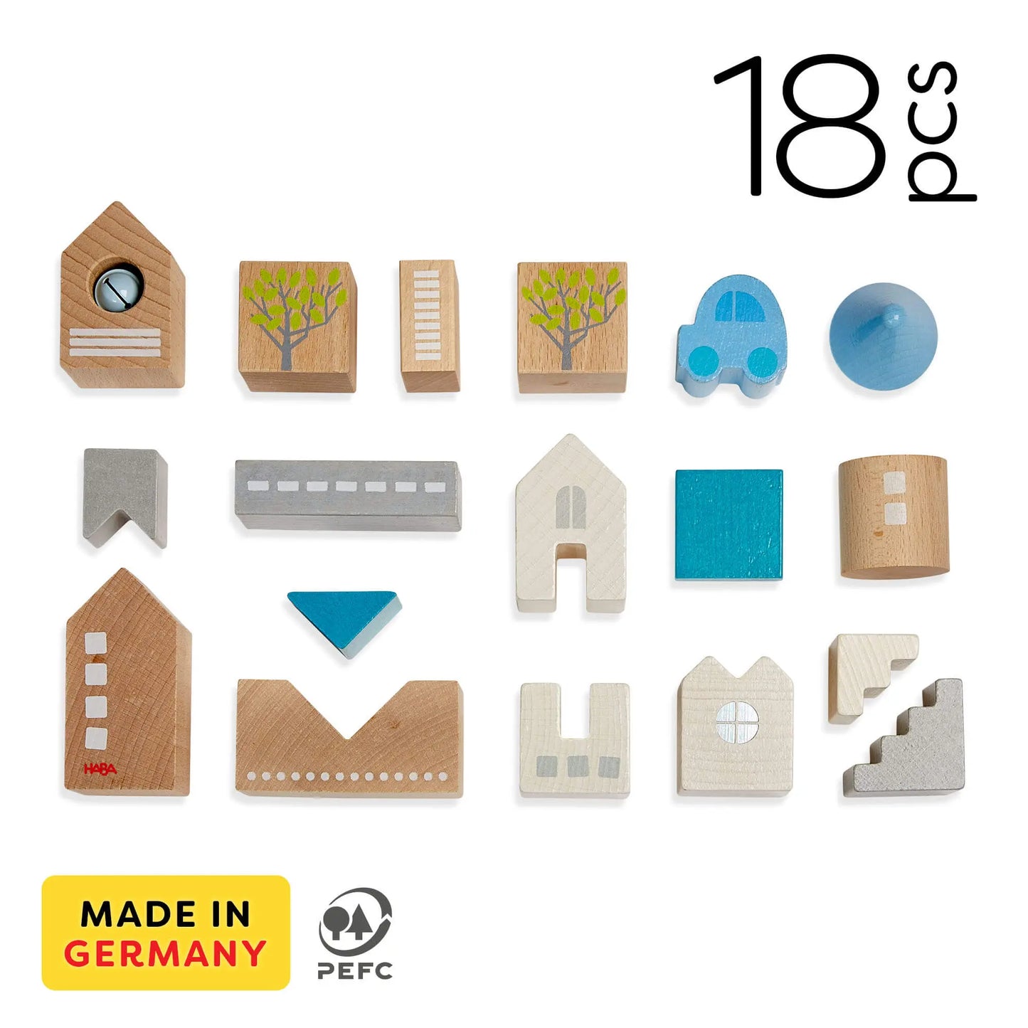 All 18 HABA Bad Rodach wooden building blocks arranged to show variety of shapes and colors, sustainable German toy