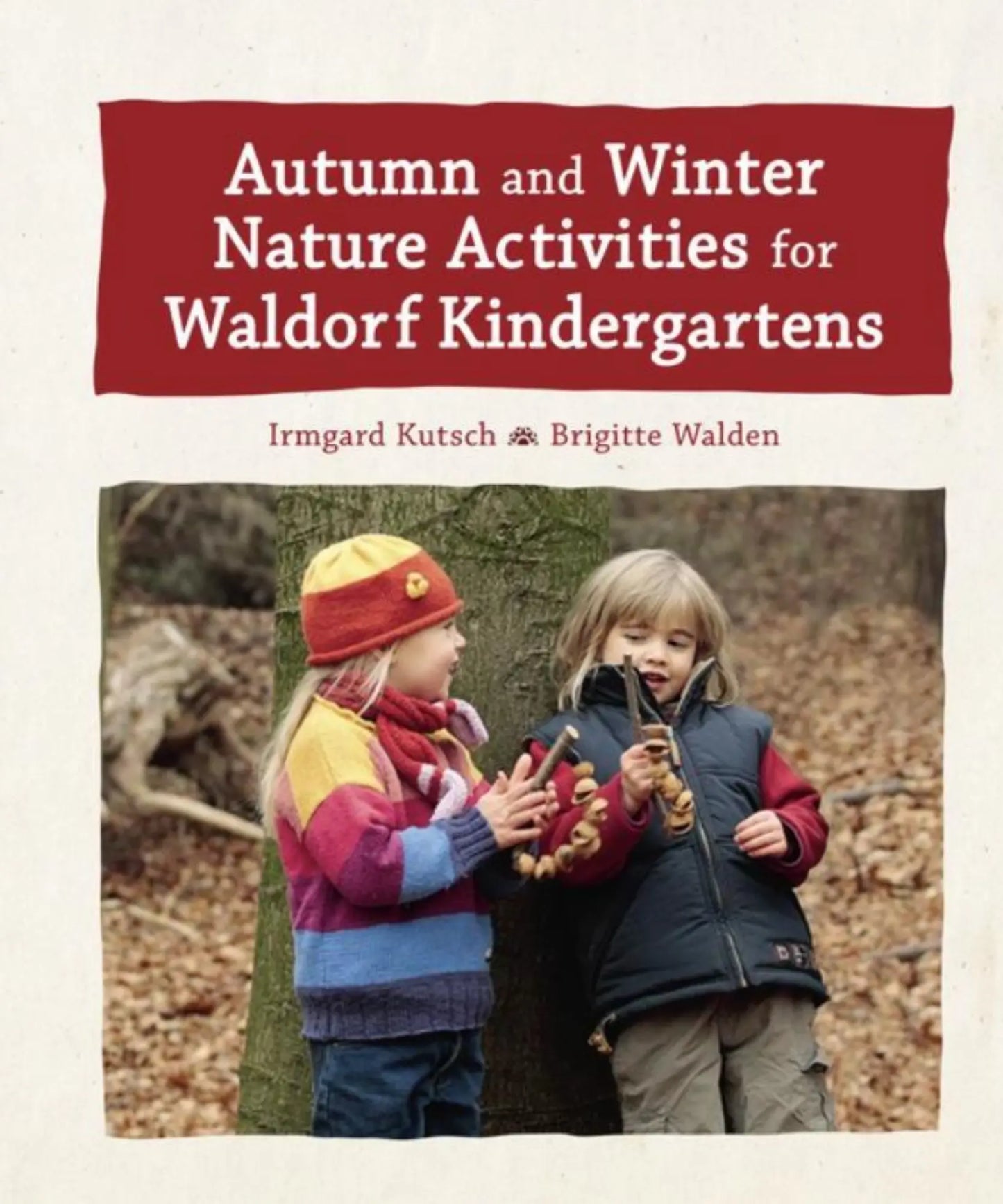 Book cover of 'Autumn and Winter Nature Activities for Waldorf Kindergartens' with two children in winter clothing.