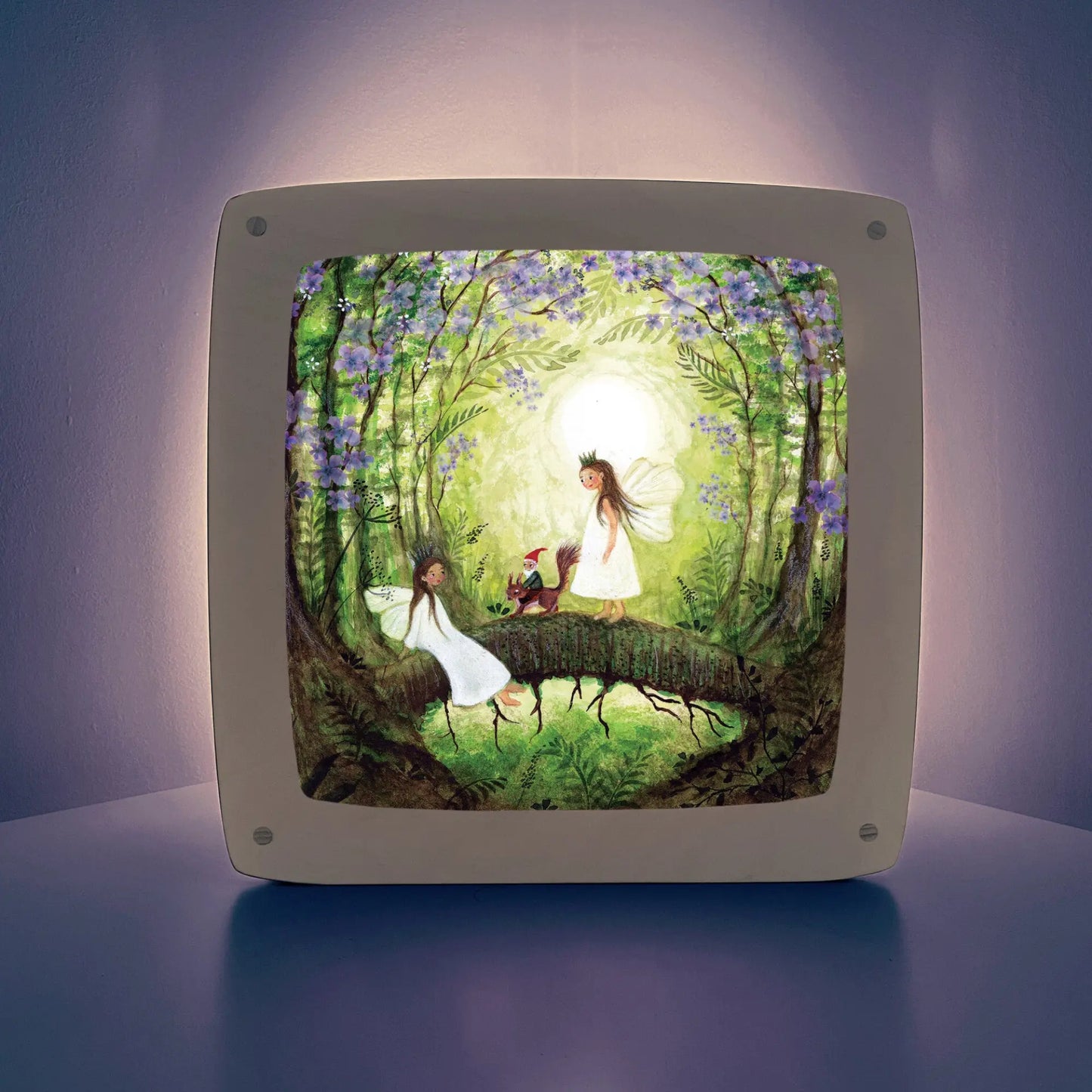 Framed lamp plate with two fairies, a gnome, and squirrel on a purple background