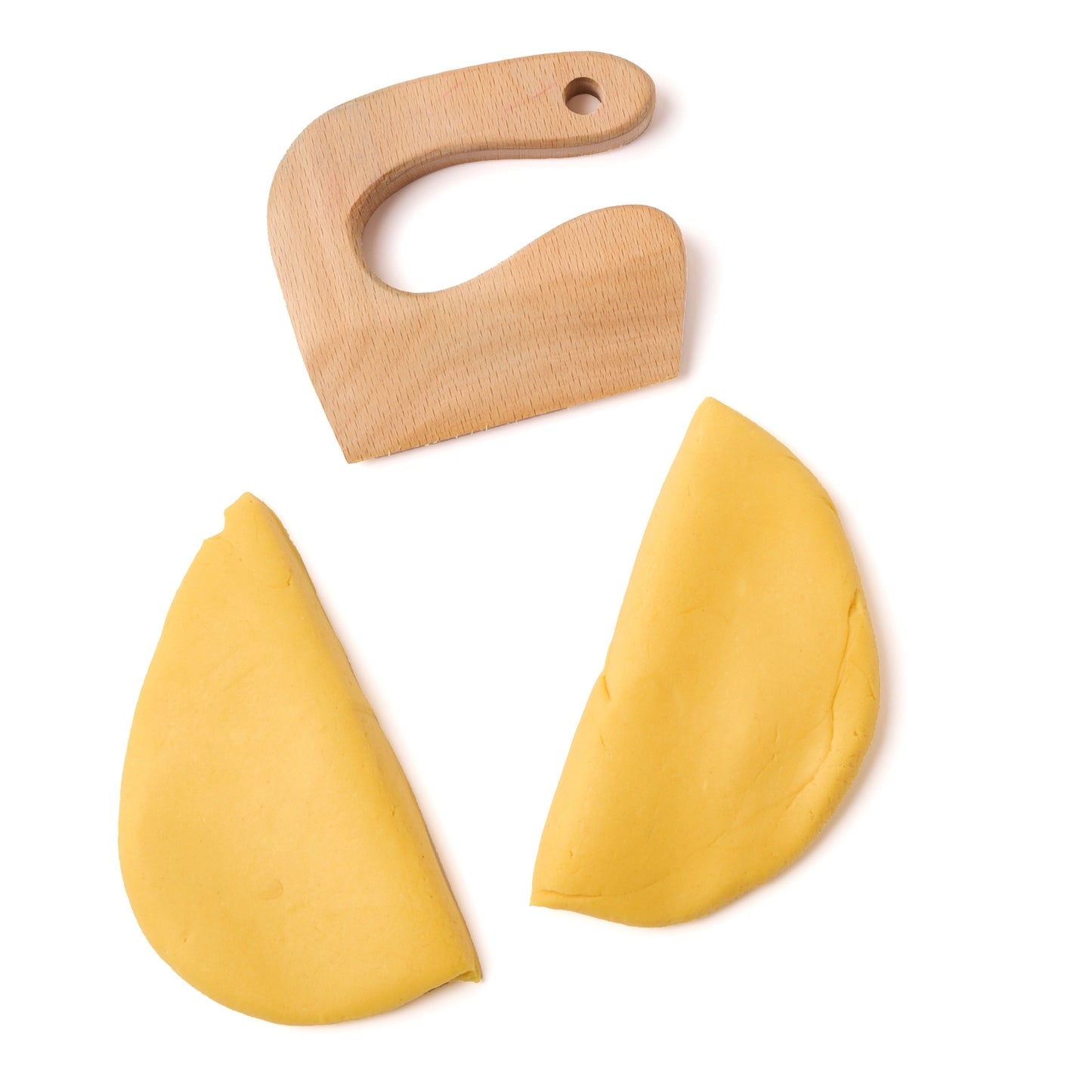 Wooden play dough cutter slicing natural dough for pretend baking and sensory play
