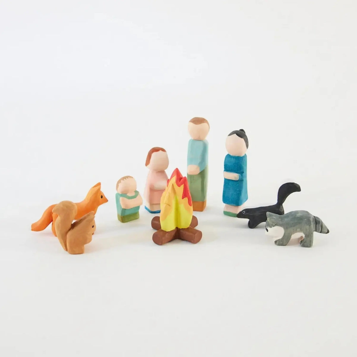 Sarah’s Silks wooden skunk with woodland animals, people, and campfire for small-world play and storytelling