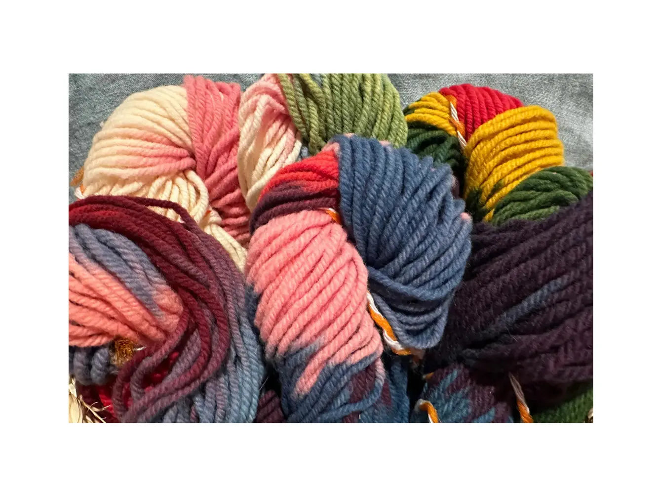 several hanks of rainbow plant dyed yarn