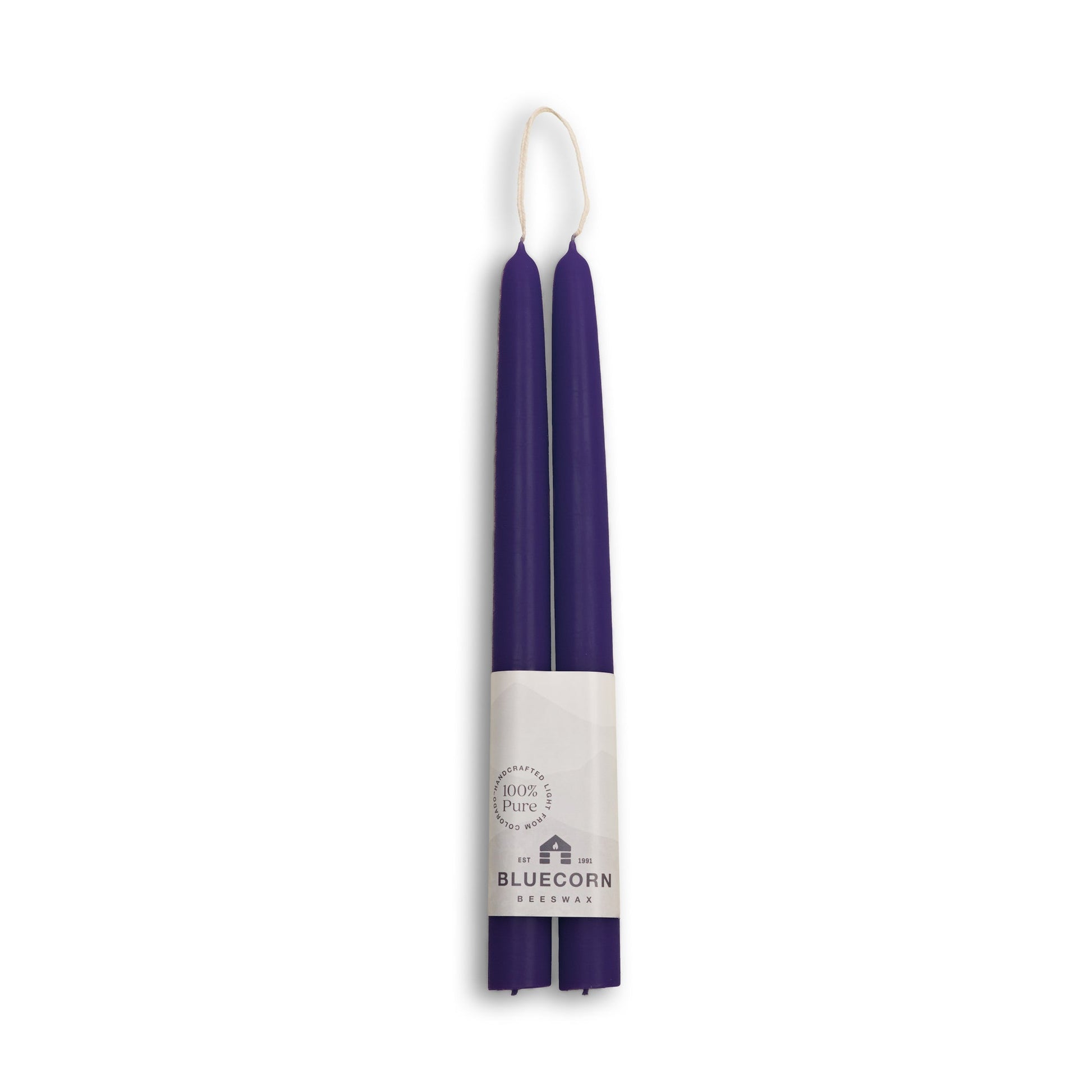 Two 10 inch eggplant candles in a white holder with 'Bluecorn' branding on a white background
