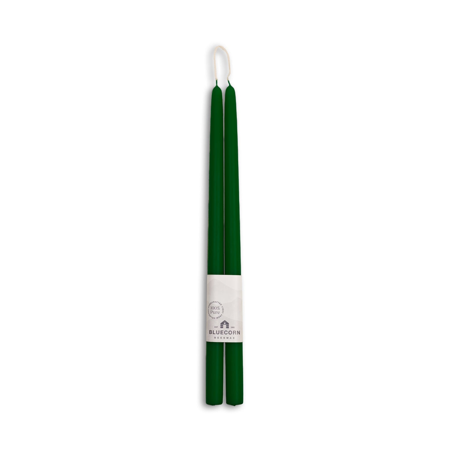 Green candle sticks with a white label on a white background