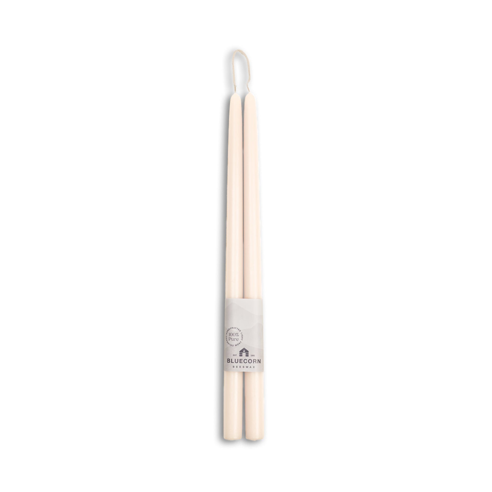 Pair of 16 inch ivory beeswax candles with a white background