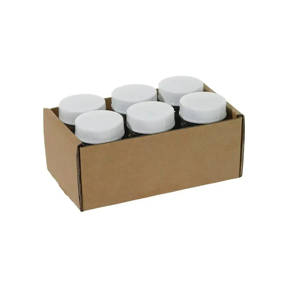 Cardboard box with six white lidded glass paint jars on a white background