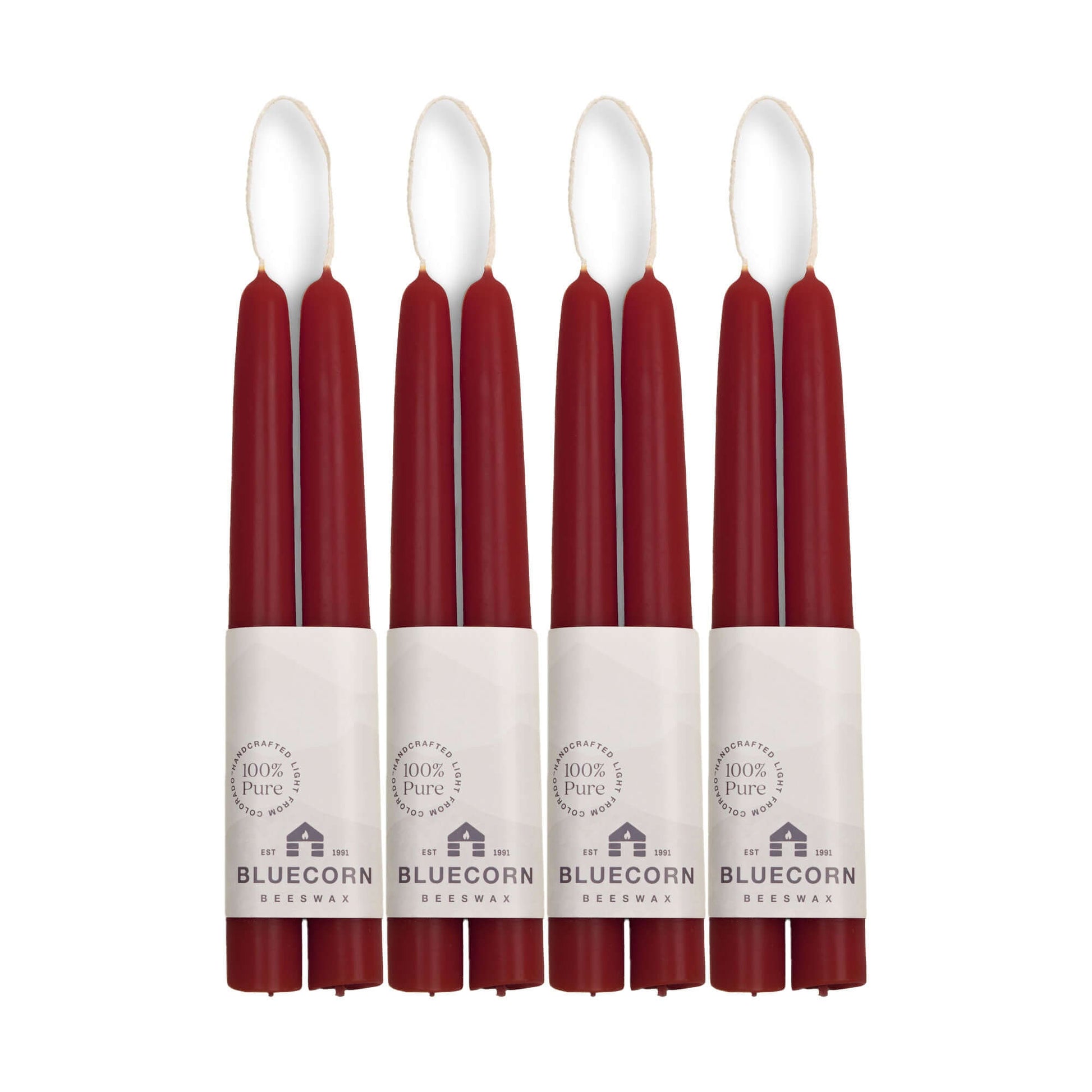 burgundy red 8-inch beeswax candles with white labels on a white background