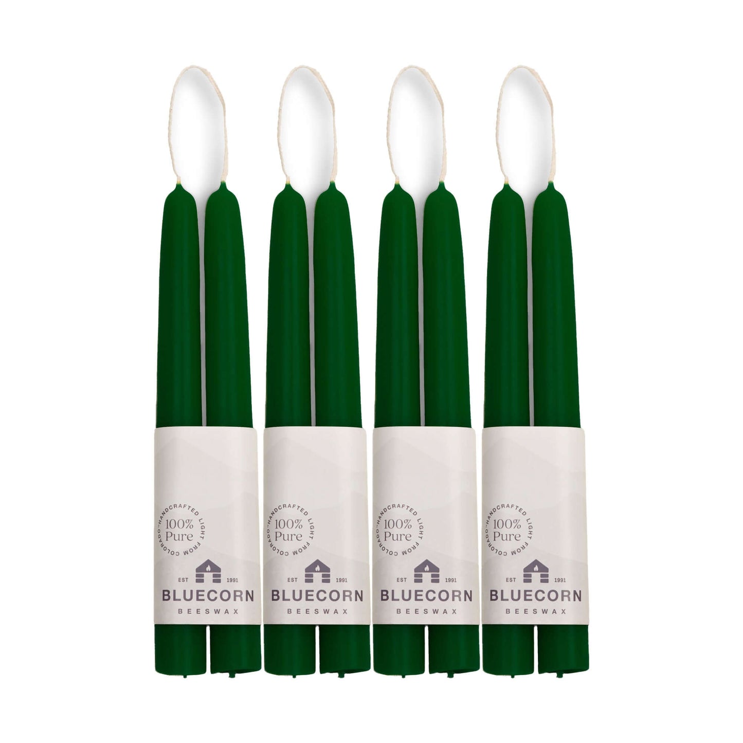 Moss green 8-inch candles with white labels on a white background