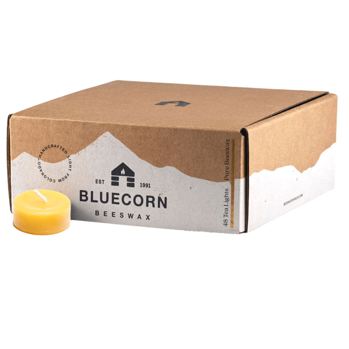 Box of Bluecorn Beeswax candles with a candle on a white background