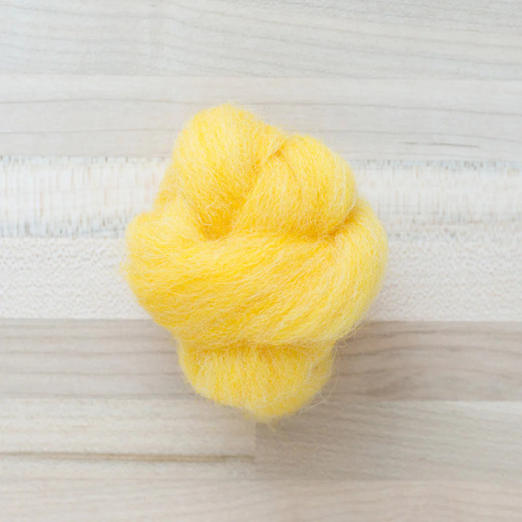 Banana Yellow Wool Roving Felter's Flowing on tabletop