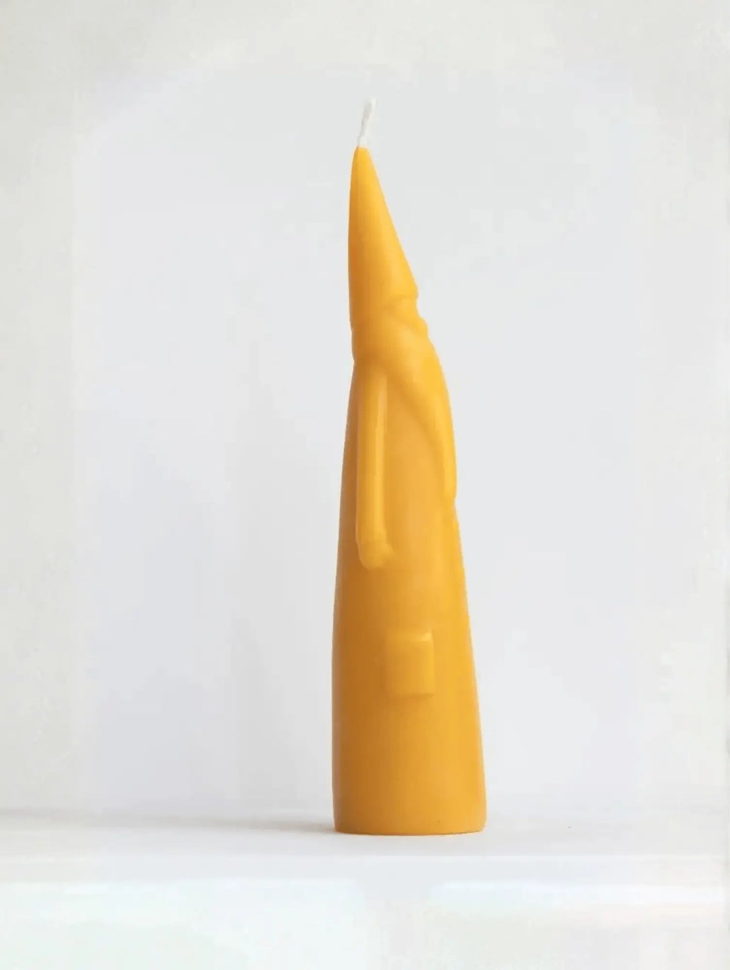 Tall Santa Claus Beeswax Candle on white background