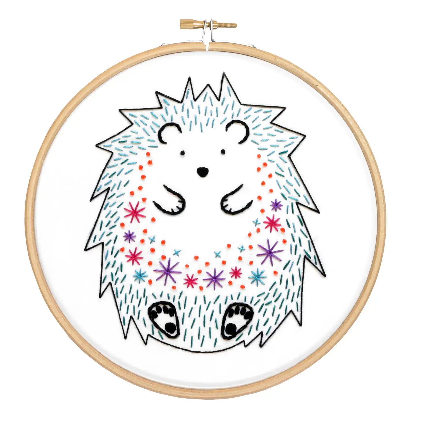 Embroidery hoop with a colorful hedgehog design on a white background