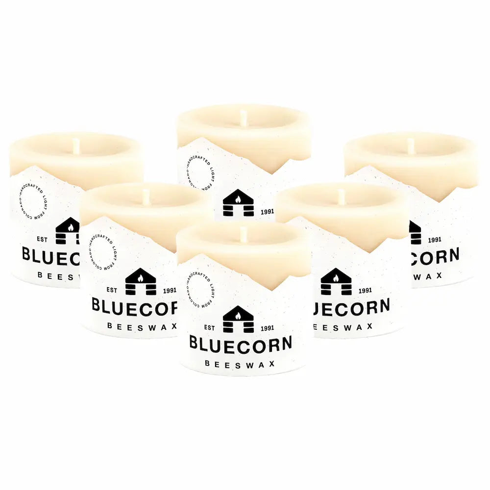 Multiple packages of Bluecorn Beeswax on a white background