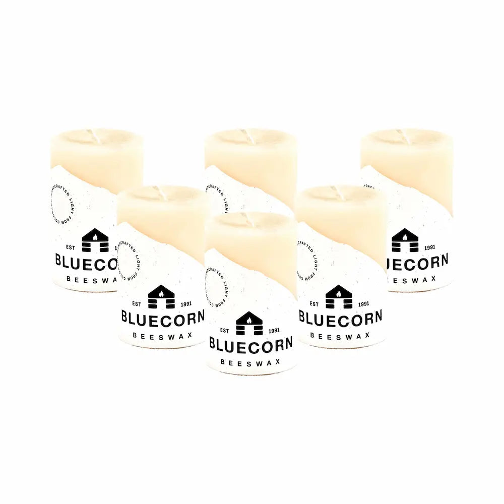 Multiple packages of Bluecorn Beeswax on a white background