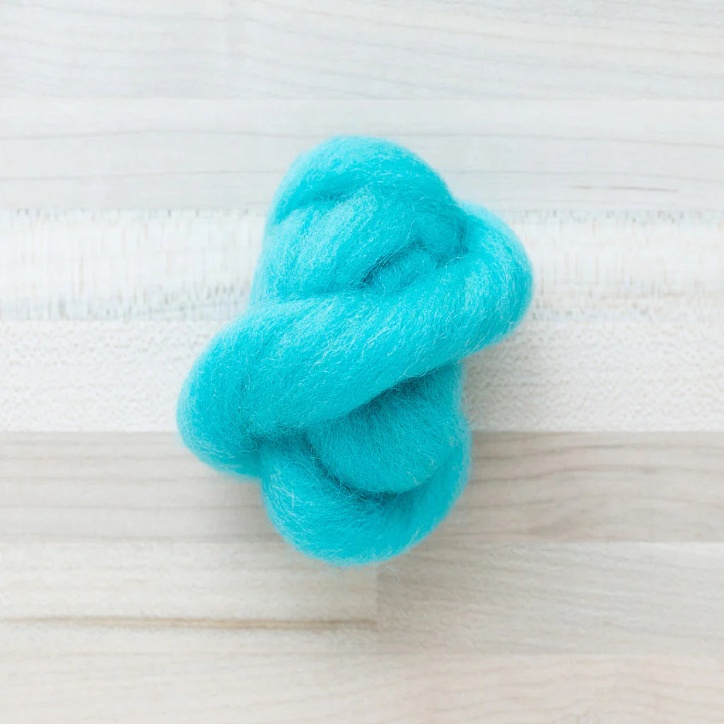 Carribean Turquoise Wool Roving Felter's Flowing on tabletop