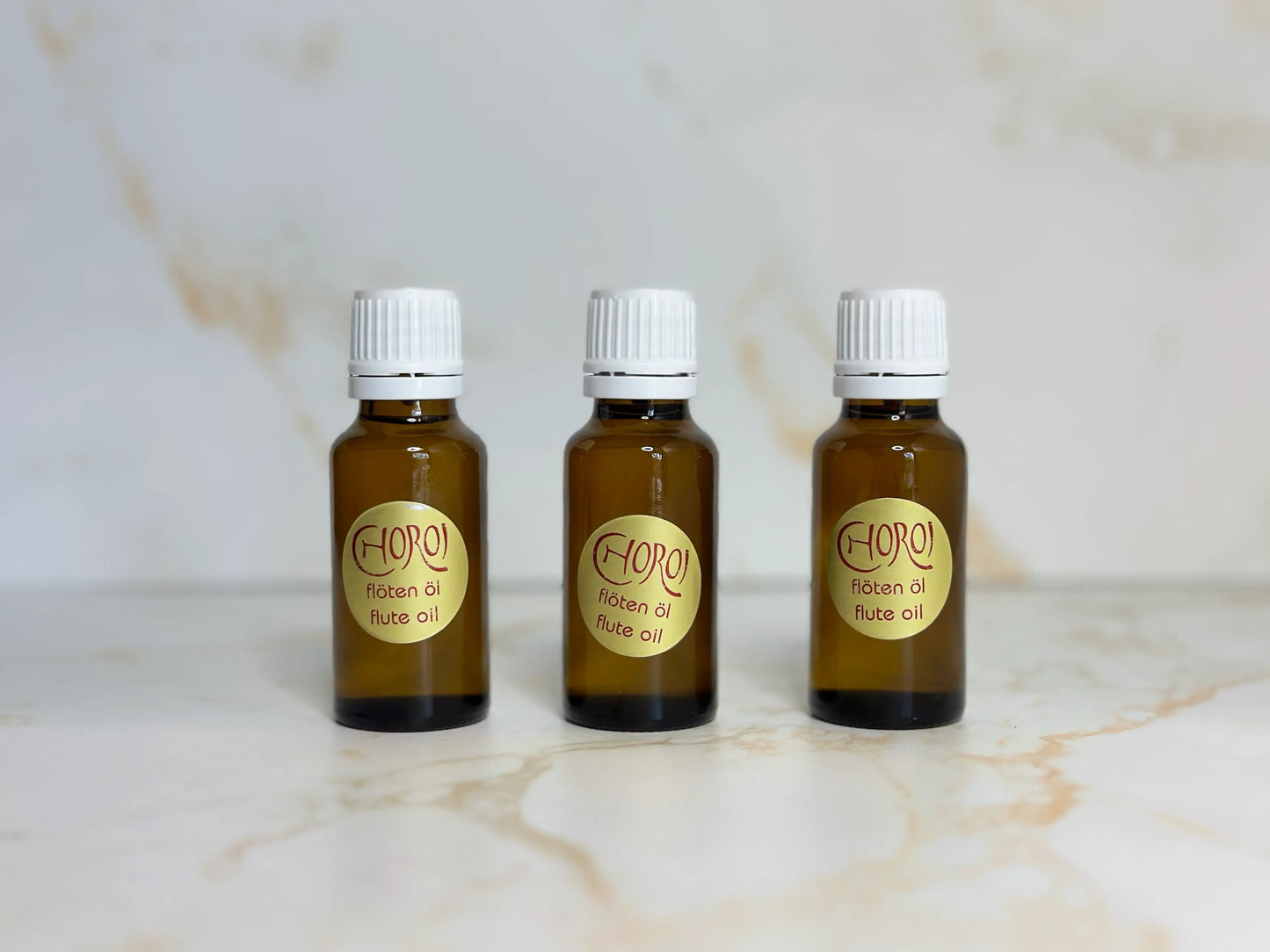 Three Choroi flute oil glass bottles for wooden flute care
