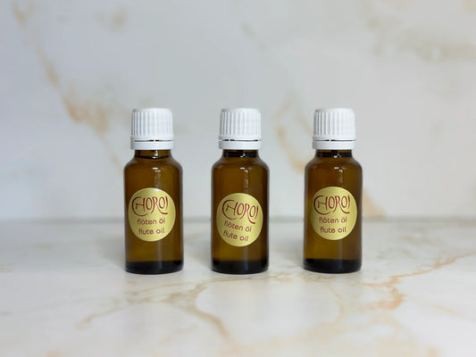 Three Choroi flute oil glass bottles for wooden flute care