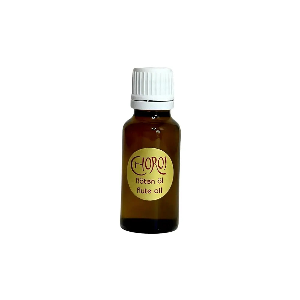 Bottle of flute oil with a white cap on a white background