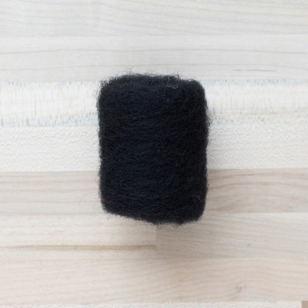 Coal Black Wool Batting by Felted Sky on a Tabletop