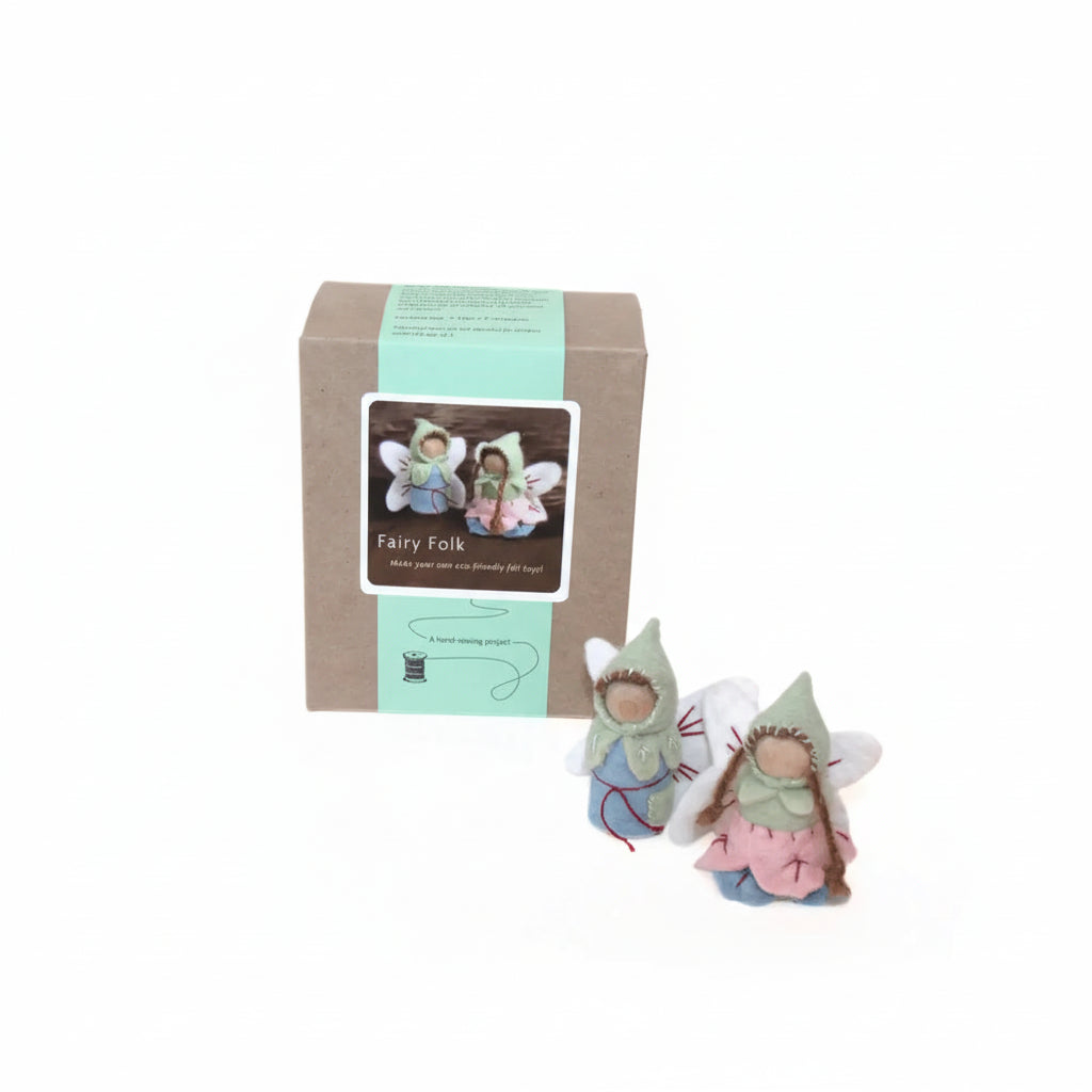 Fairy Folk felt toy kit with two small fairy dolls and a cardboard box packaging on a white background.