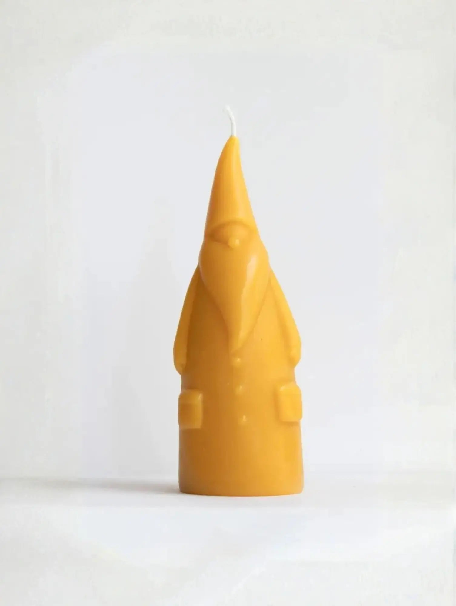 Short Santa Claus Beeswax Candle on white background