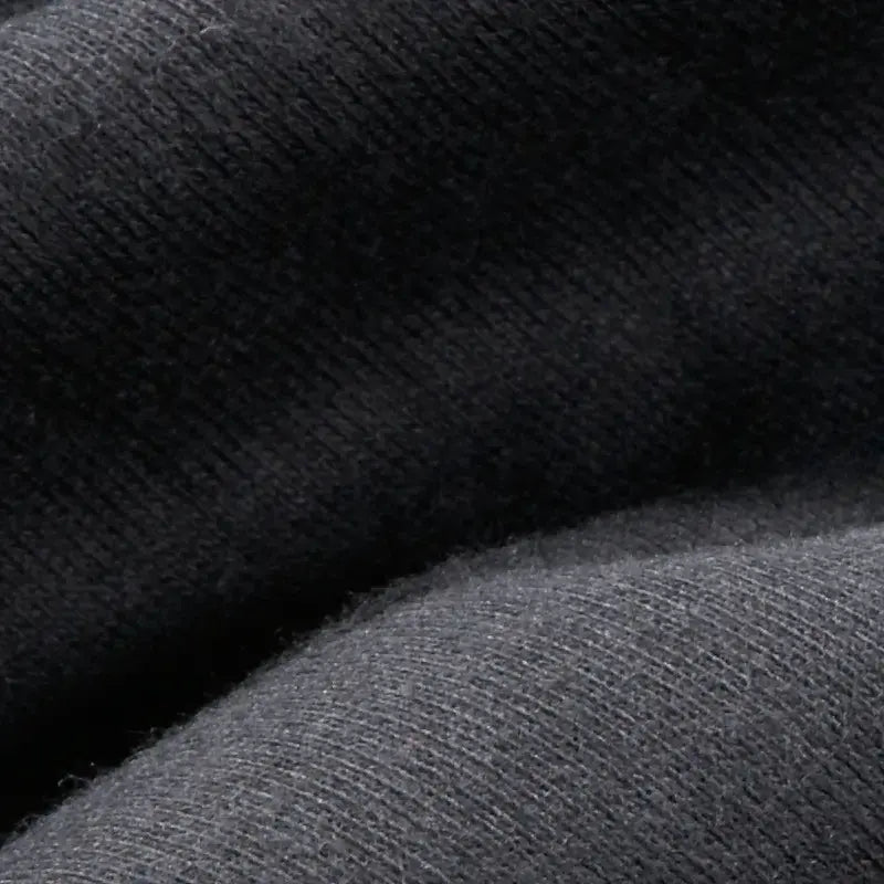 Close-up of black organic doll making fabric texture