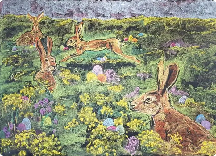 Four hares in a field of flowers with painted eggs in a meadow