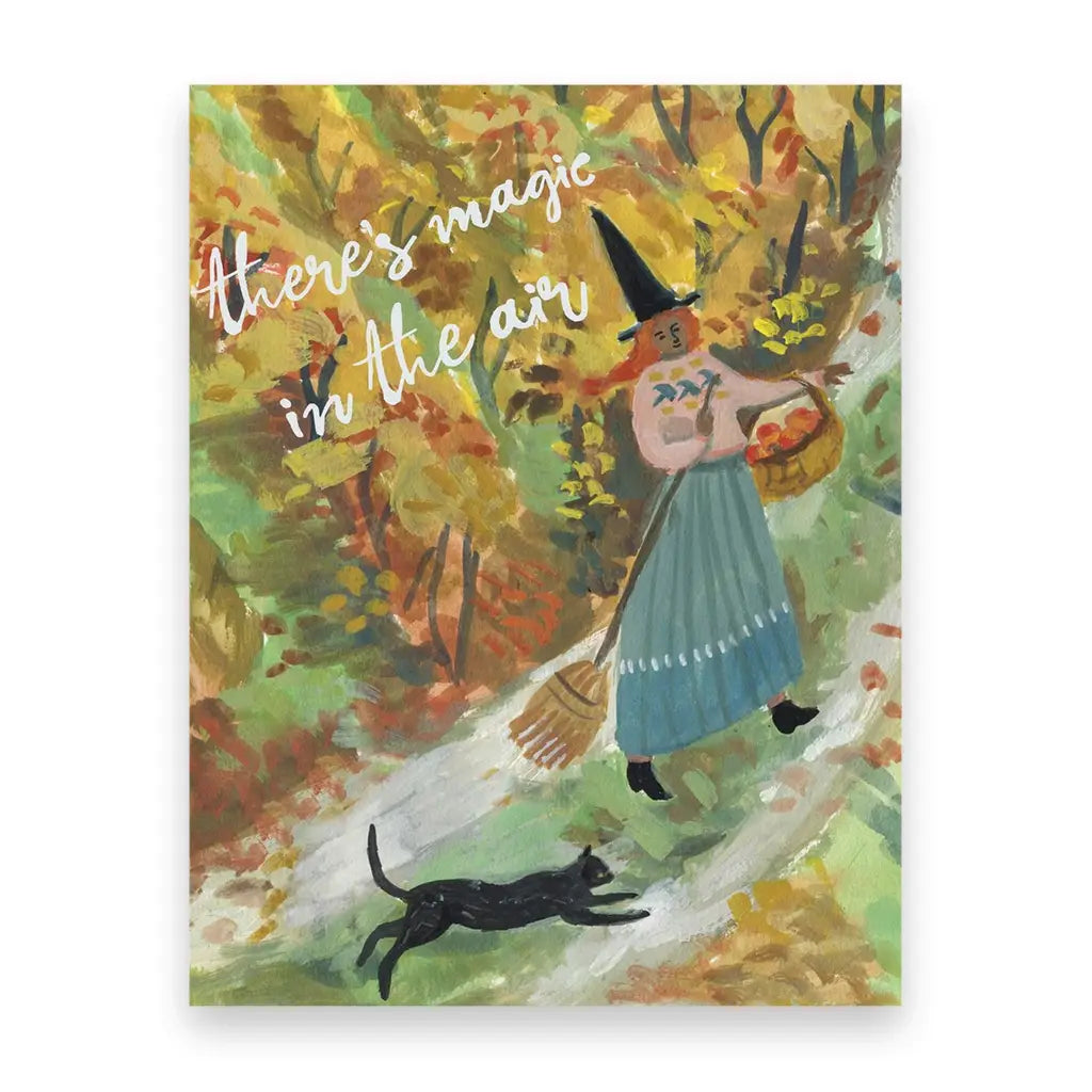 Illustration of a witch with a black cat in an autumn forest, with text 'there's magic in the air'.