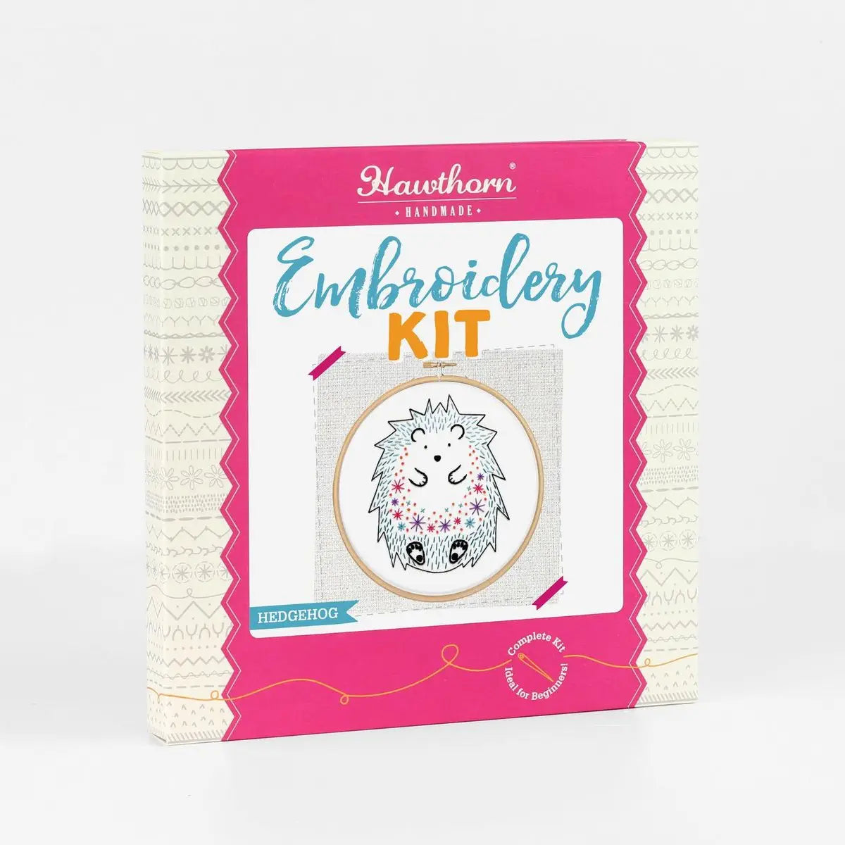 Embroidery kit packaging with a hedgehog design on a white background