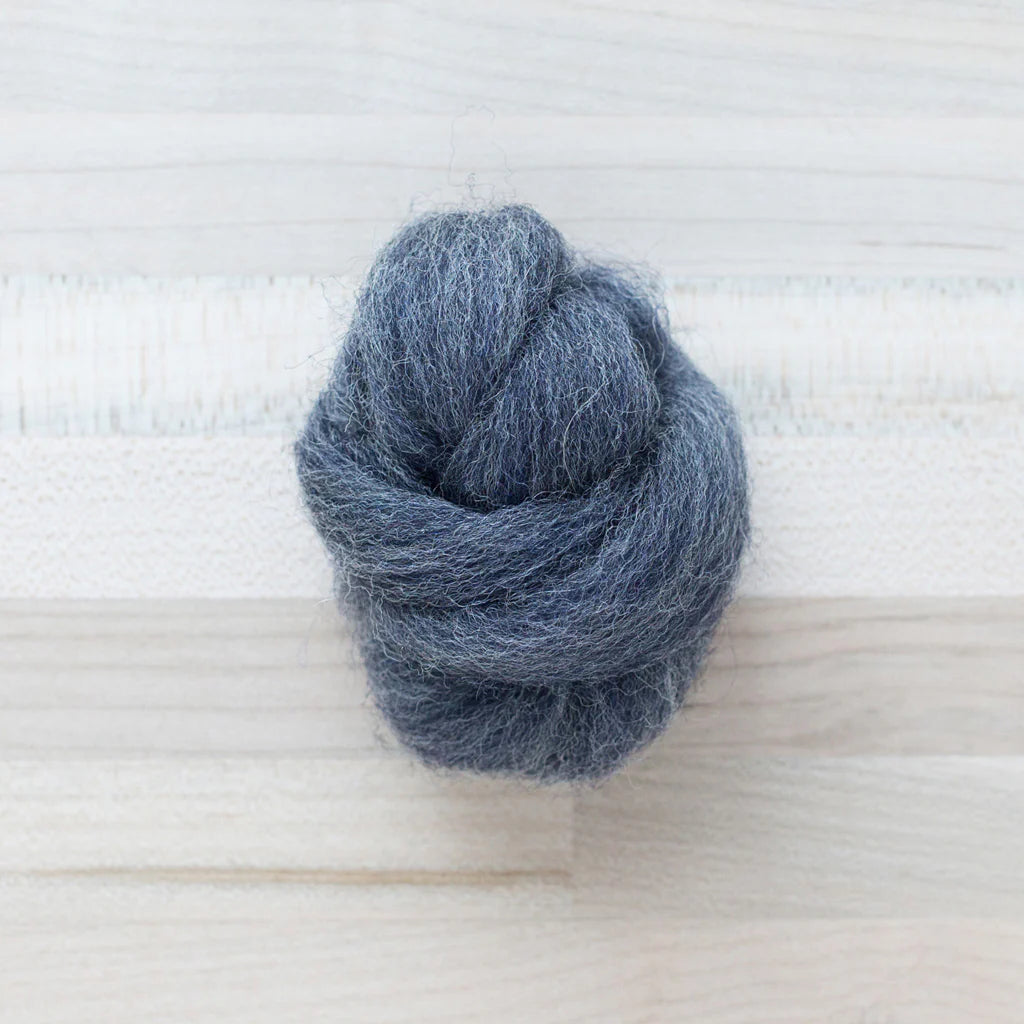 Humpback Whale Dark Gray Wool Roving Felter's Flowing on tabletop