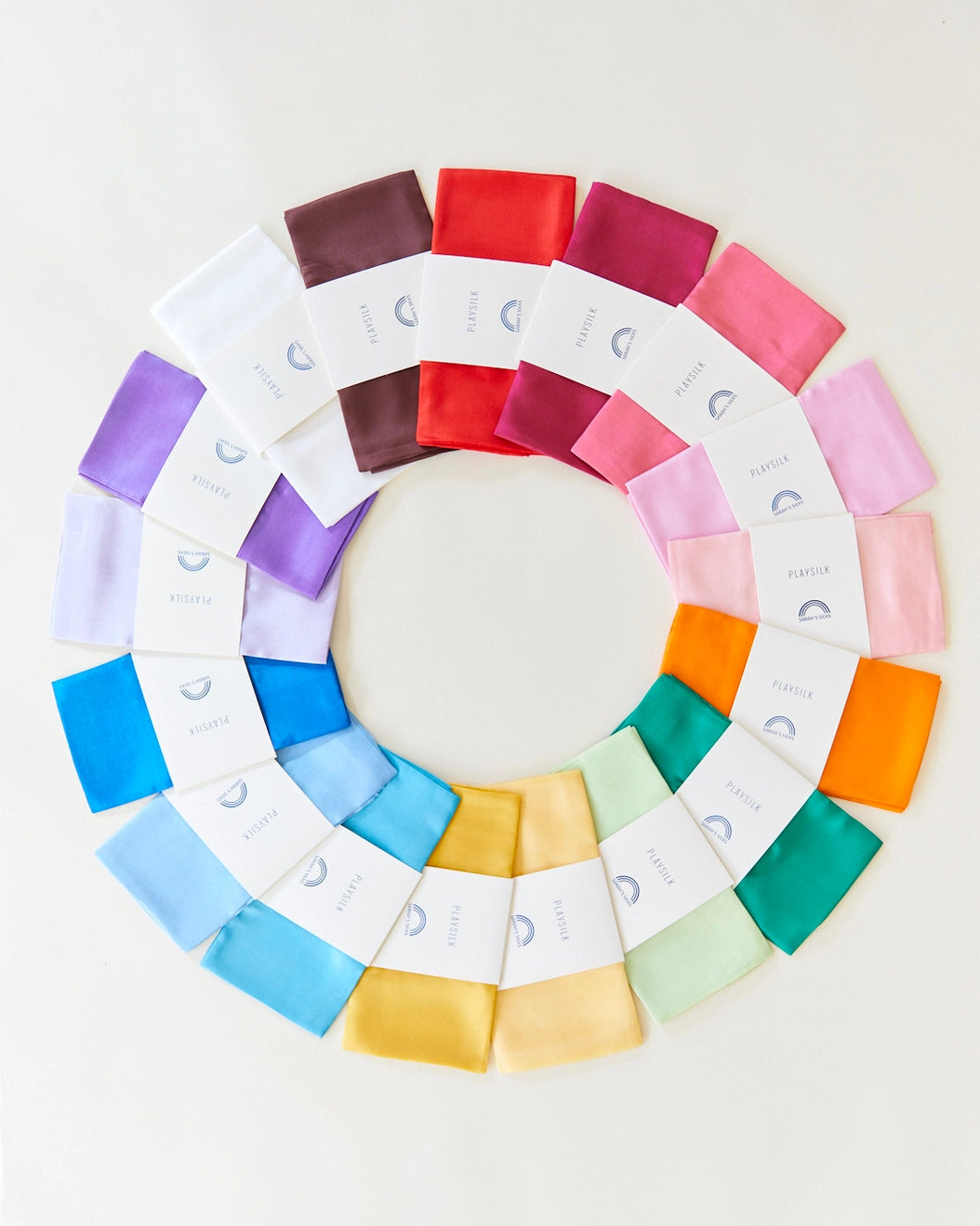 Sarah's Silks Solid Color Playsilks in Multiple Colors arranged in a circle on a White Background