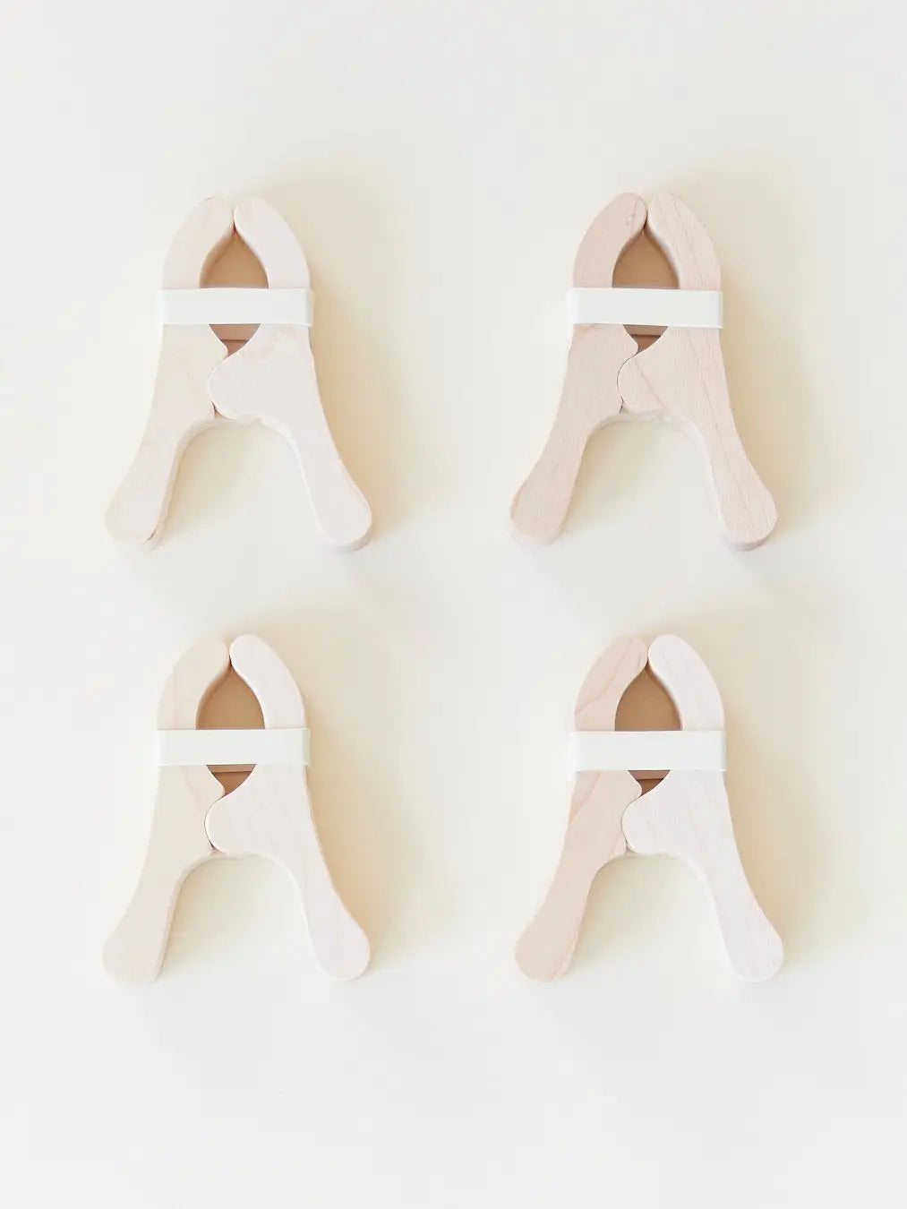 Sarah’s Silks Four Playcloth Clips on a white background