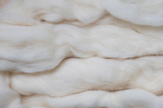 Close-up of Corriedale core wool batting – springy, fluffy natural stuffing fiber
