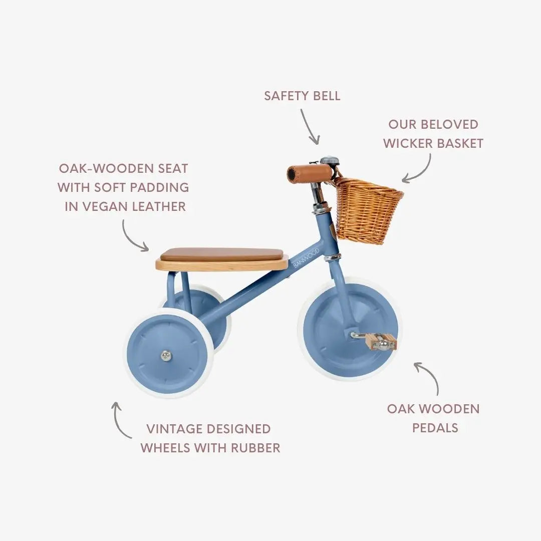 Banwood vintage toddler tricycle in blue side view with text explaining features