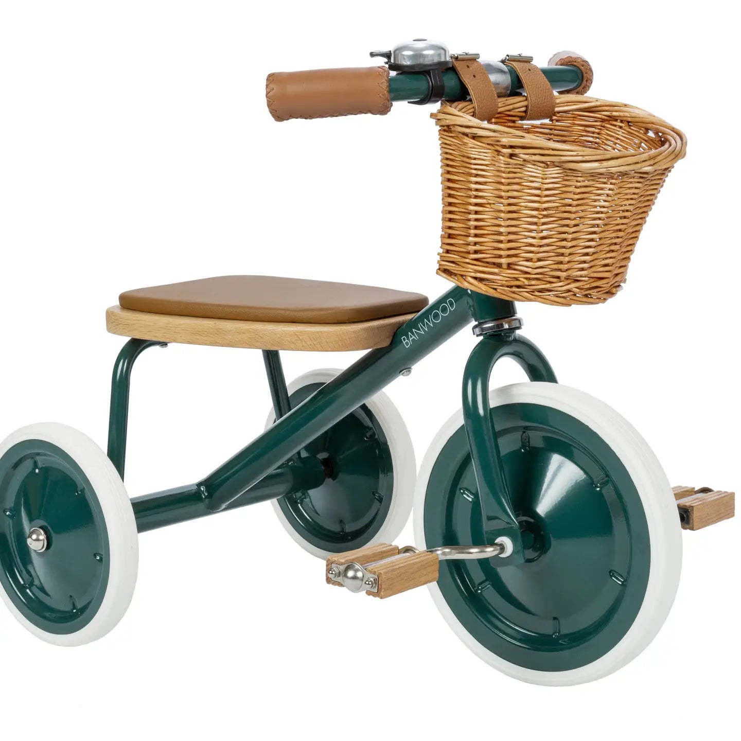 Children's tricycle with a wicker basket and wooden seat on a white background