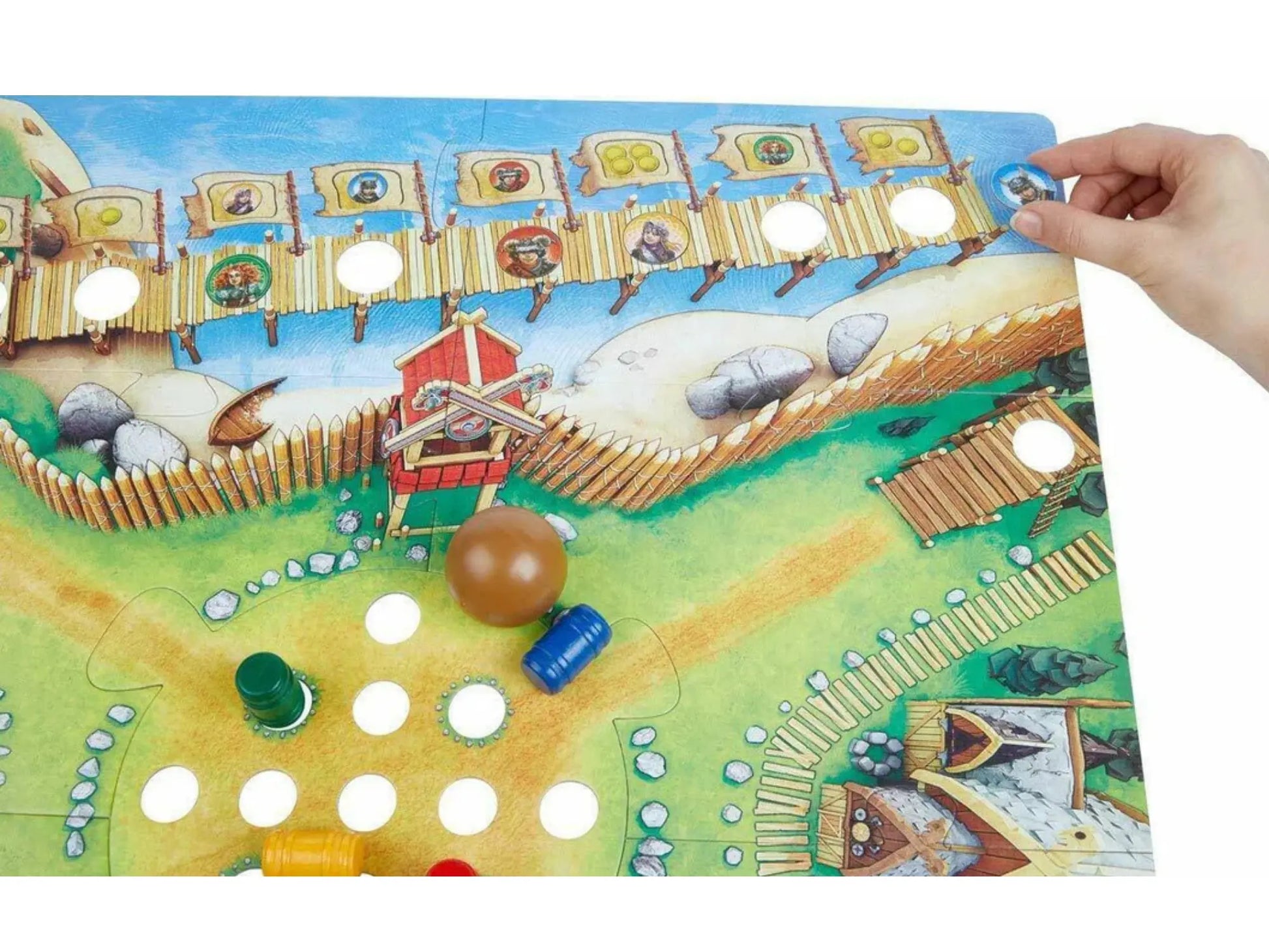 HABA Kids Board game piece with colorful illustrations and a hand interacting with it