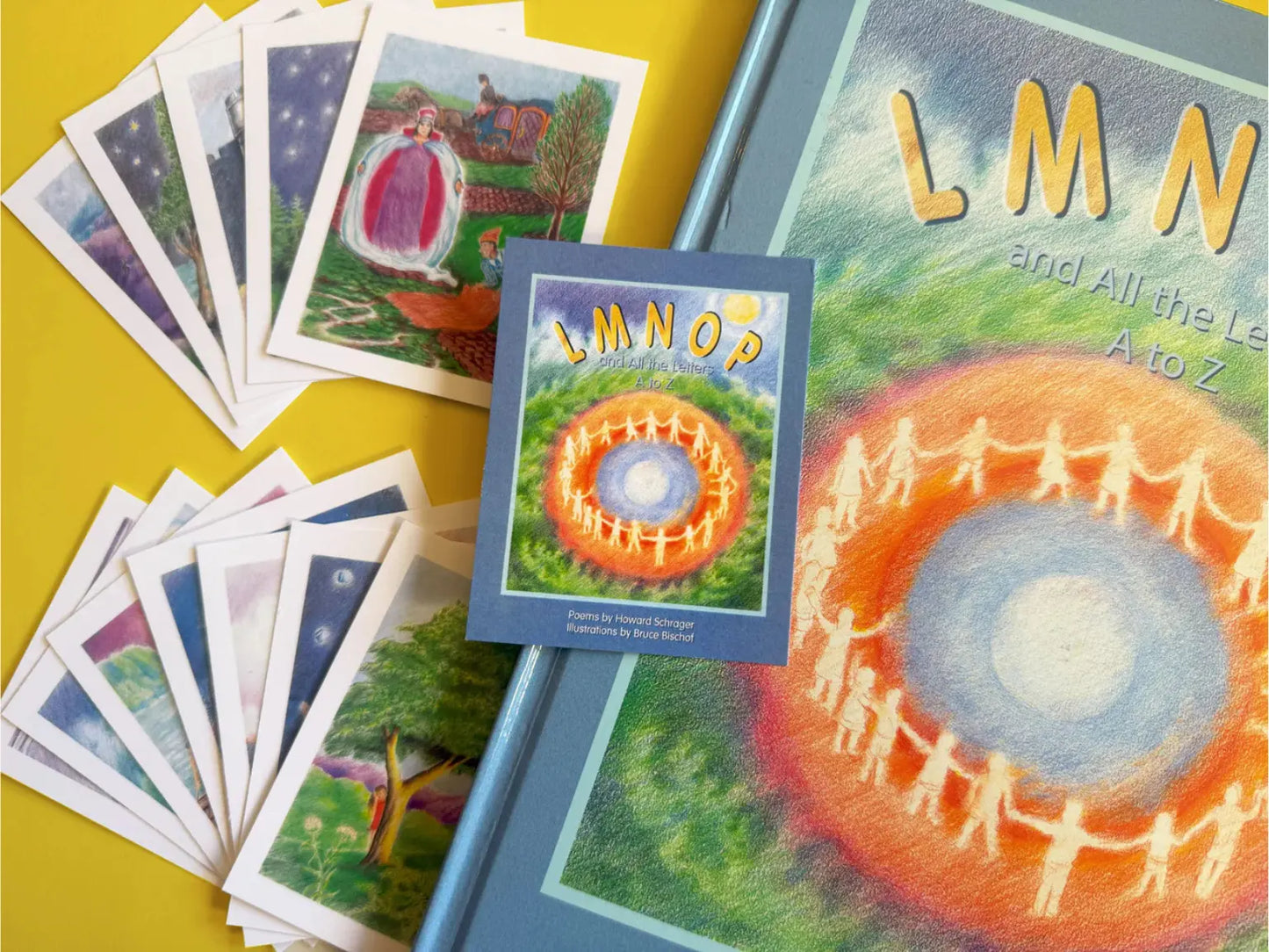 Educational cards and books with colorful illustrations on a yellow background