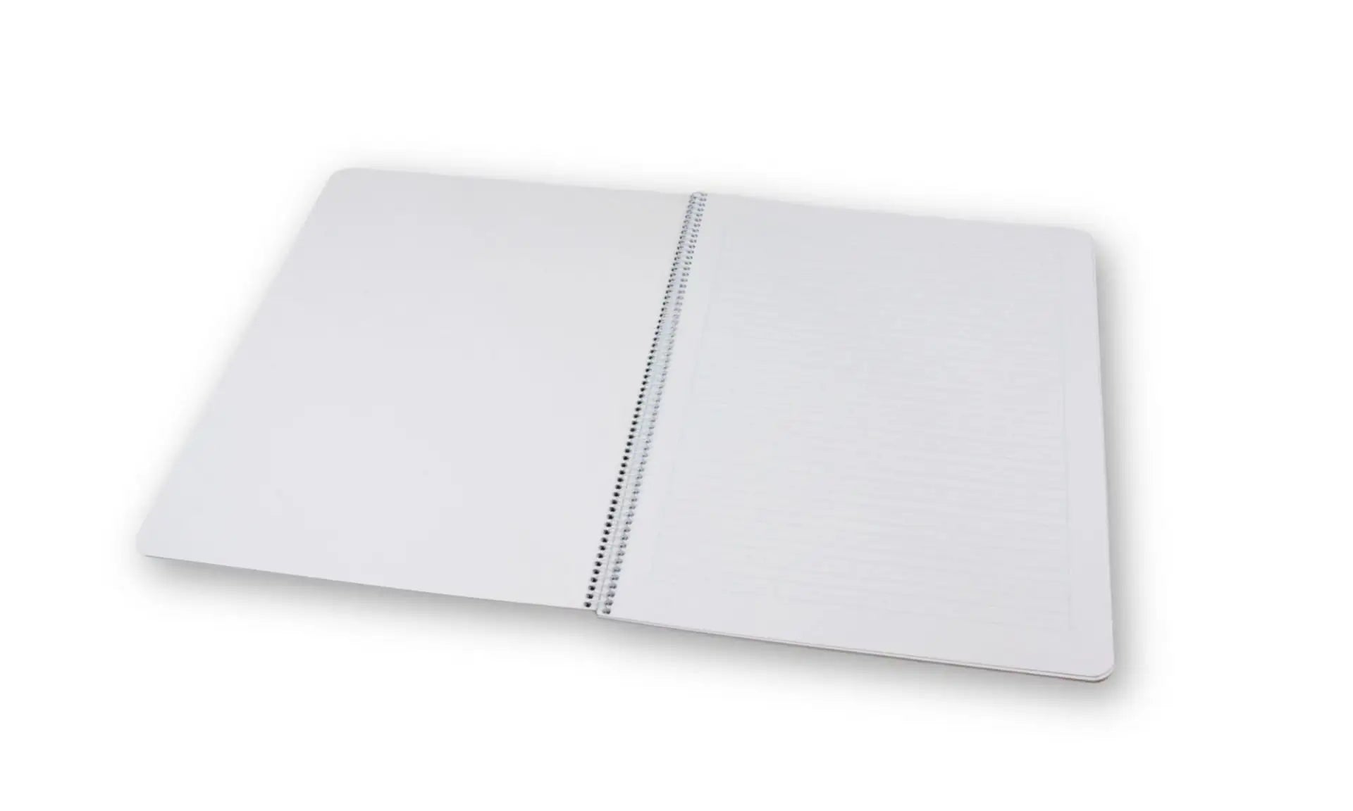White notebook with a grid pattern on a white background