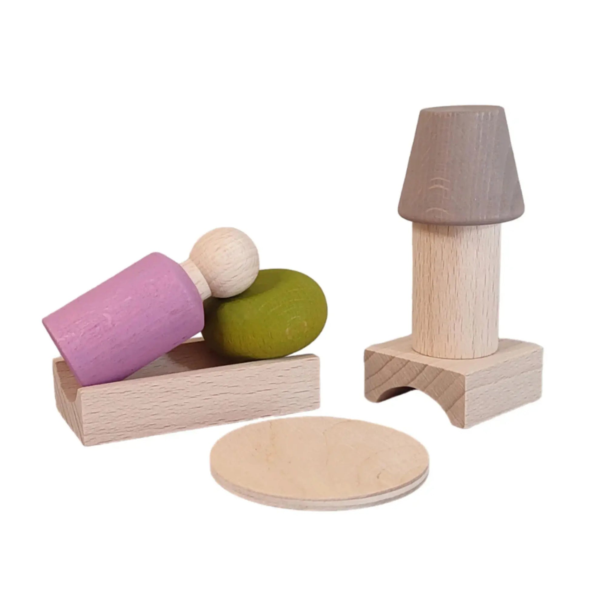 Set of wooden toys including a lamp, blocks, and a tray on a white background